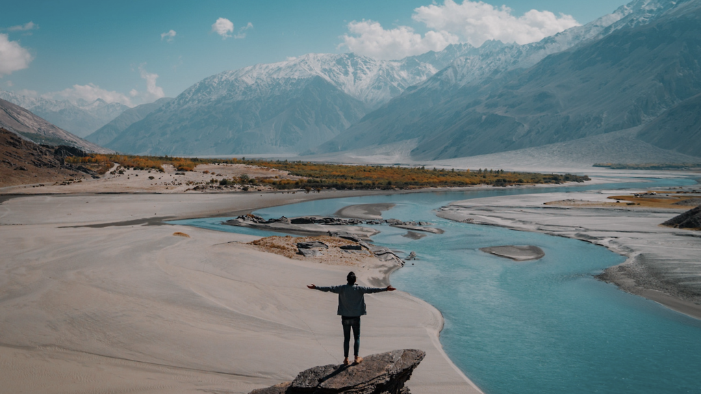 Landscape-with-mountains-river-and-person