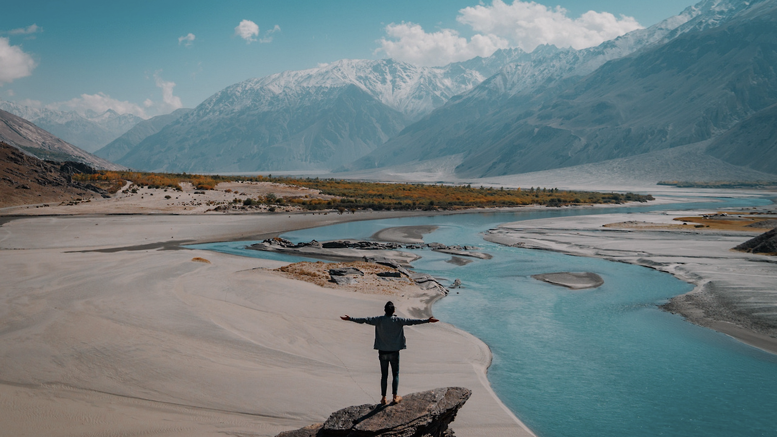Welcome here Landscape-with-mountains-river-and-person